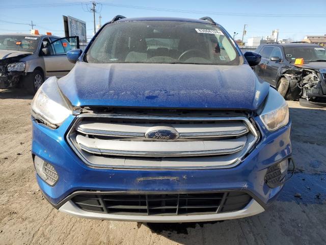 Photo 5 from auction – 2018 FORD ESCAPE SE with VIN 1FMCU0GD8JUA35529