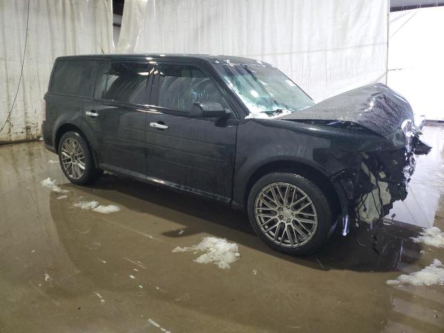 Photo 4 from auction – 2016 FORD FLEX LIMIT with VIN 2FMHK6D81GBA04935