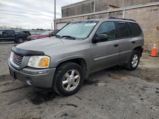 GMC ENVOY 2006 with VIN 1GKDT13S462107498 - Photo from auction