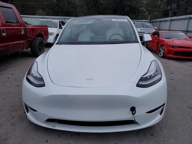 Photo 5 from auction – 2023 TESLA MODEL Y with VIN 7SAYGDEE9PF610410