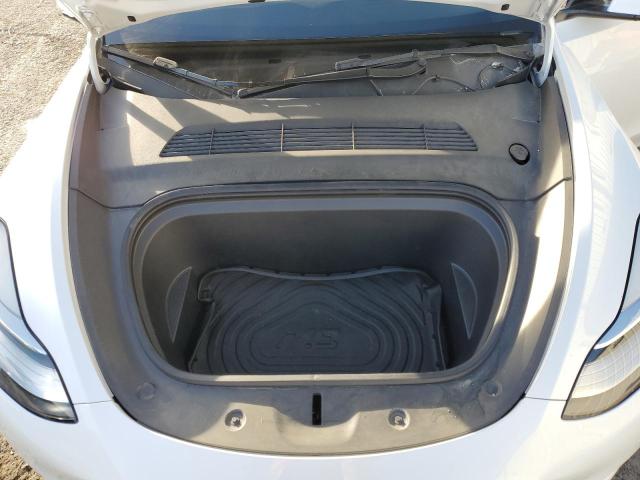 Photo 11 from auction – 2022 TESLA MODEL Y with VIN 7SAYGDEE4NF321285