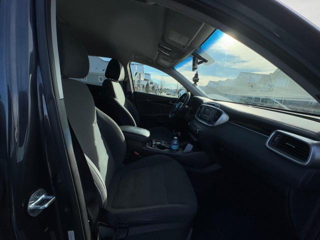 Photo 9 from auction – 2016 KIA SORENTO LX with VIN 5XYPGDA18GG091337
