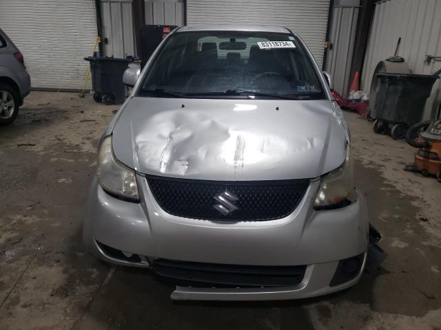 Photo 5 from auction – 2011 SUZUKI SX4 LE with VIN JS2YC5A21B6300076