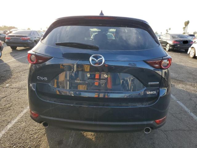 Photo 6 from auction – 2021 MAZDA CX-5 TOURI with VIN JM3KFACM3M0425138
