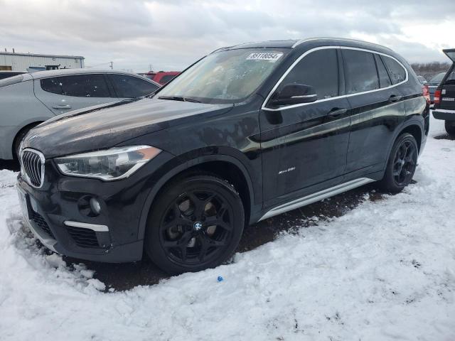 BMW X1 XDRIVE2 2017 with VIN WBXHT3C3XH5F85353 - Photo from auction