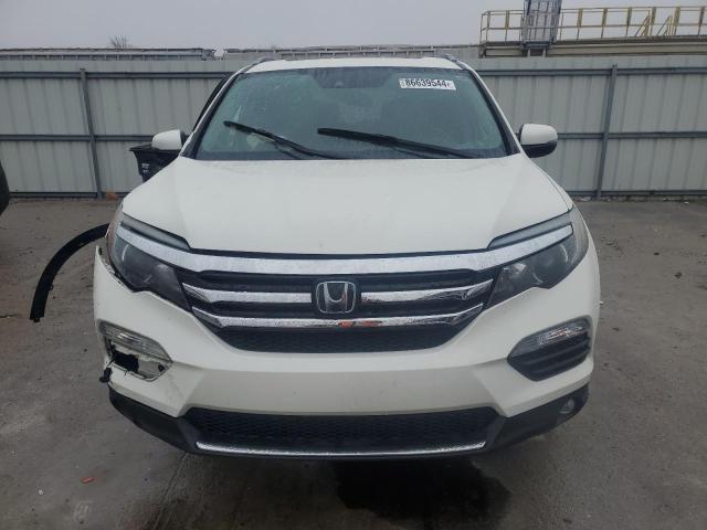 Photo 5 from auction – 2018 HONDA PILOT TOUR with VIN 5FNYF5H98JB024535