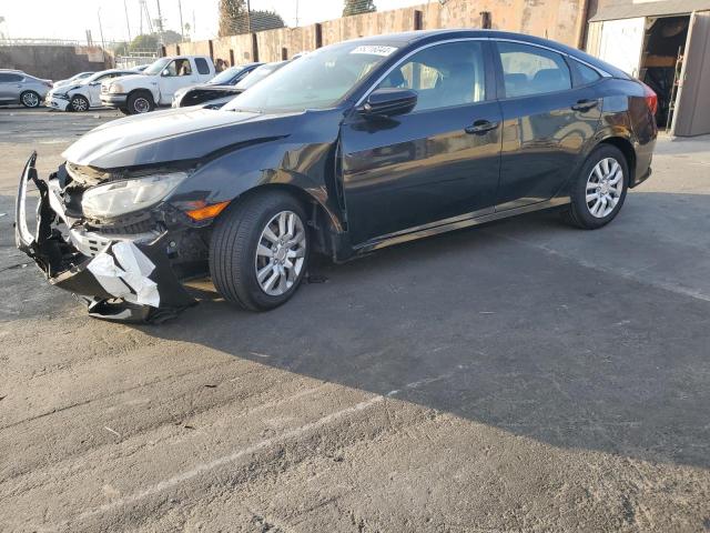 HONDA CIVIC LX 2016 with VIN 2HGFC2F53GH543284 - Photo from auction