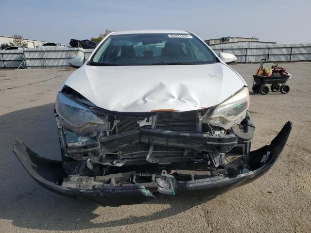 Photo 5 from auction – 2014 TOYOTA COROLLA L with VIN 2T1BURHE5EC174029