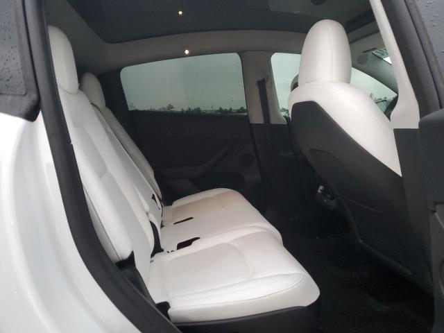 Photo 11 from auction – 2023 TESLA MODEL Y with VIN 7SAYGAEE1PF785314