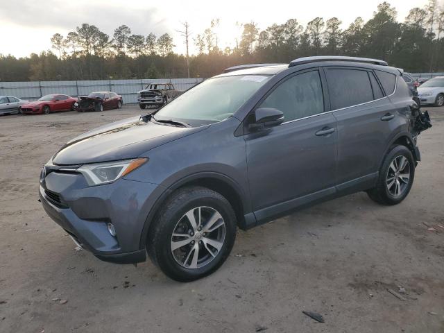 TOYOTA RAV4 XLE 2016 with VIN 2T3WFREV7GW264338 - Photo from auction
