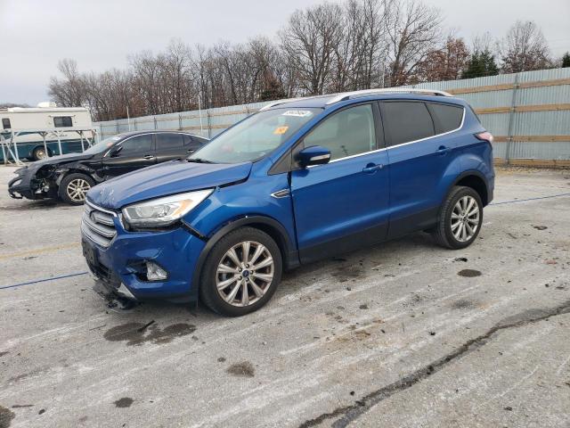 FORD ESCAPE TIT 2017 with VIN 1FMCU0JD5HUD19719 - Photo from auction