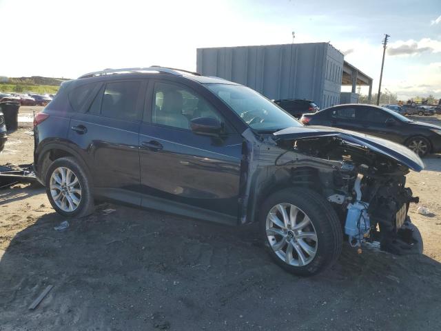 Photo 4 from auction – 2014 MAZDA CX-5 GT with VIN JM3KE4DYXE0370985