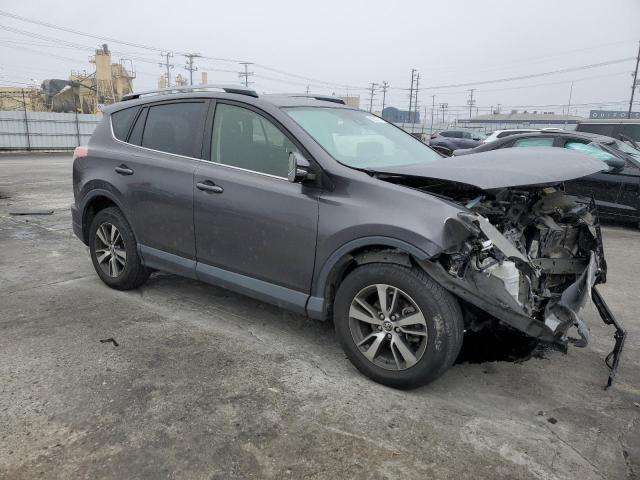 Photo 4 from auction – 2017 TOYOTA RAV4 XLE with VIN JTMWFREV7HJ701528