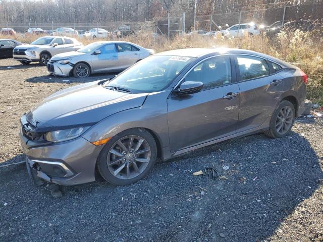 HONDA CIVIC EX 2019 with VIN 19XFC1F32KE209971 - Photo from auction