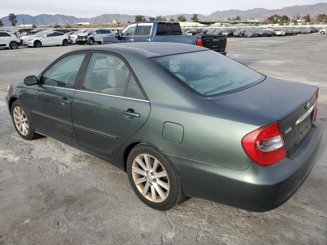 Photo 2 from auction – 2002 TOYOTA CAMRY LE with VIN JTDBE32K220135476