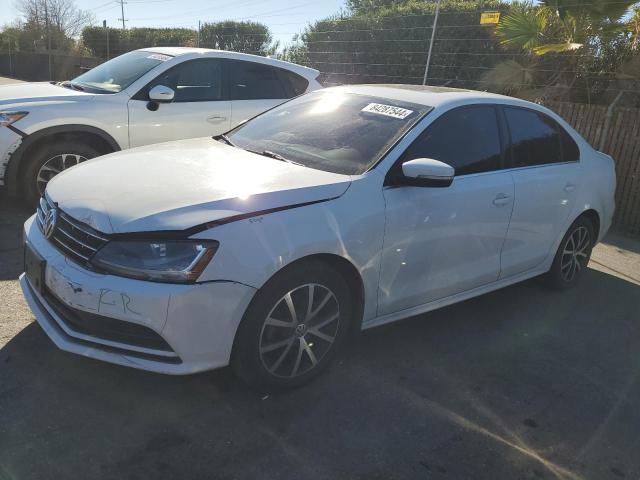 VOLKSWAGEN JETTA SE 2018 with VIN 3VWDB7AJ3JM220143 - Photo from auction