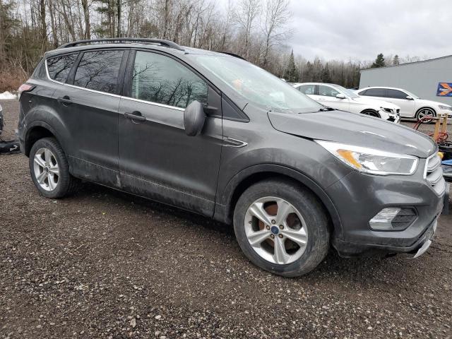 Photo 4 from auction – 2018 FORD ESCAPE SE with VIN 1FMCU9GD1JUA92885