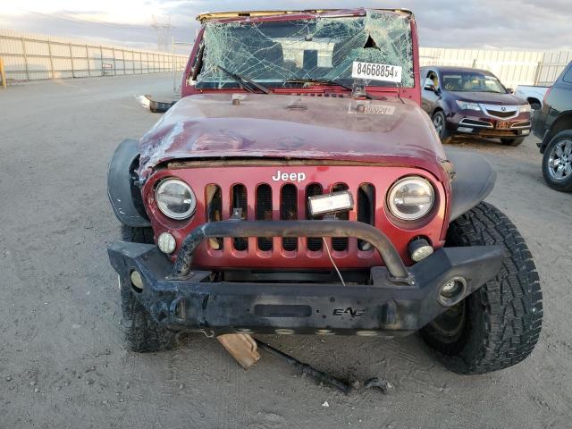 Photo 5 from auction – 2011 JEEP WRANGLER U with VIN 1J4BA3H13BL579257