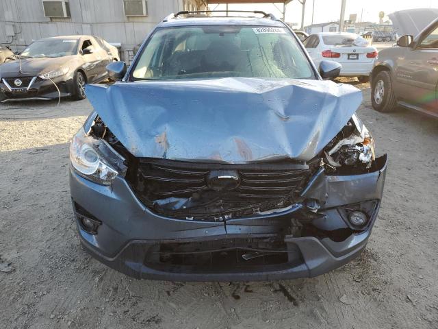 Photo 5 from auction – 2016 MAZDA CX-5 TOURI with VIN JM3KE2CY9G0681106