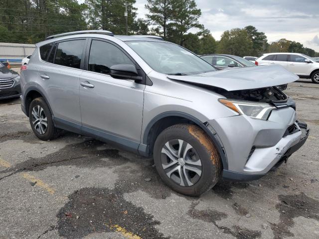 Photo 4 from auction – 2018 TOYOTA RAV4 LE with VIN JTMZFREV2JJ199093