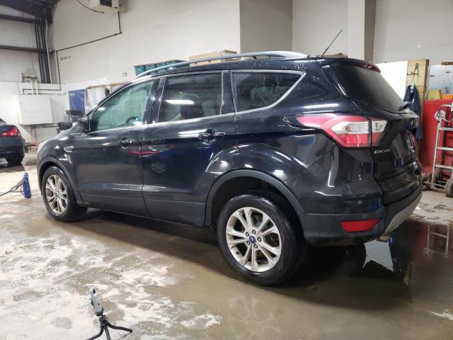 Photo 2 from auction – 2017 FORD ESCAPE SE with VIN 1FMCU9GD5HUD85599