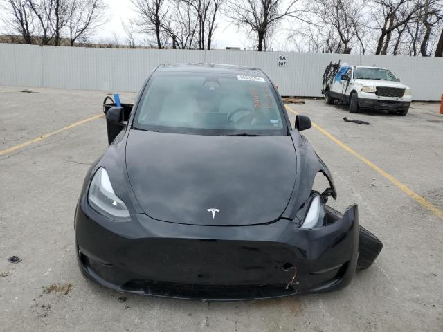 Снимка 5 от търг – 2023 TESLA MODEL Y с VIN 7SAYGDEF7PF660537