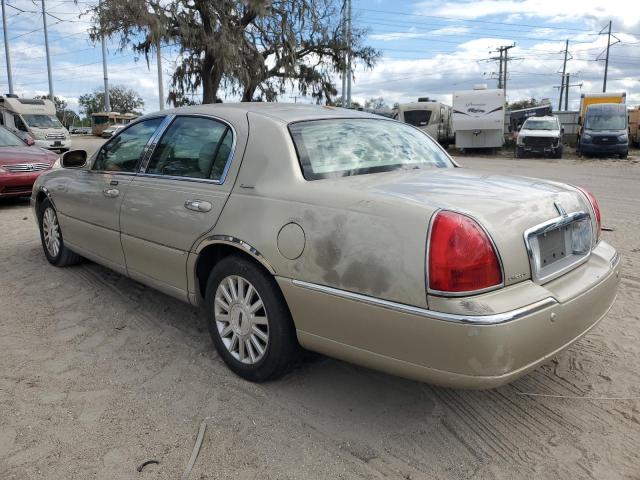 Photo 2 from auction – 2004 LINCOLN TOWN CAR E with VIN 1LNHM81W54Y675113