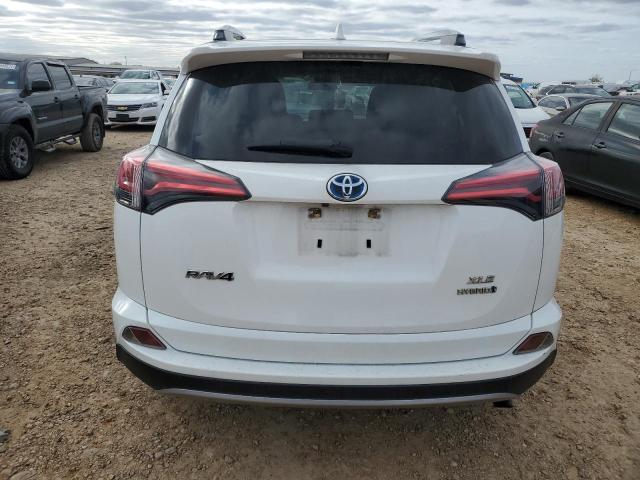 Photo 6 from auction – 2017 TOYOTA RAV4 HV LE with VIN JTMRJREV2HD082170