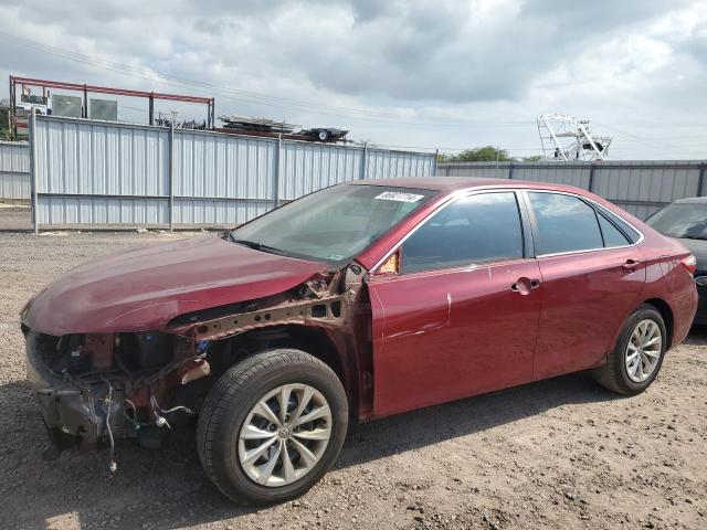 TOYOTA CAMRY LE 2015 with VIN 4T1BF1FKXFU883091 - Photo from auction