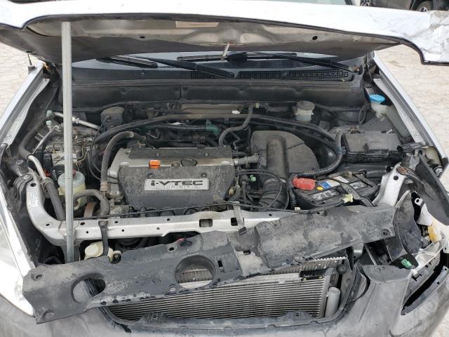 Photo 12 from auction – 2004 HONDA CR-V EX with VIN JHLRD78884C048027