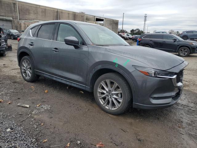 Photo 4 from auction – 2021 MAZDA CX-5 GRAND with VIN JM3KFBAYXM0467334