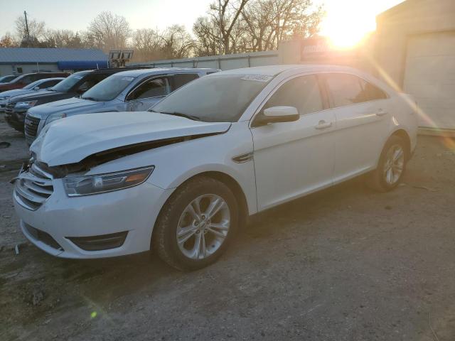 FORD TAURUS SEL 2014 with VIN 1FAHP2E88EG157725 - Photo from auction