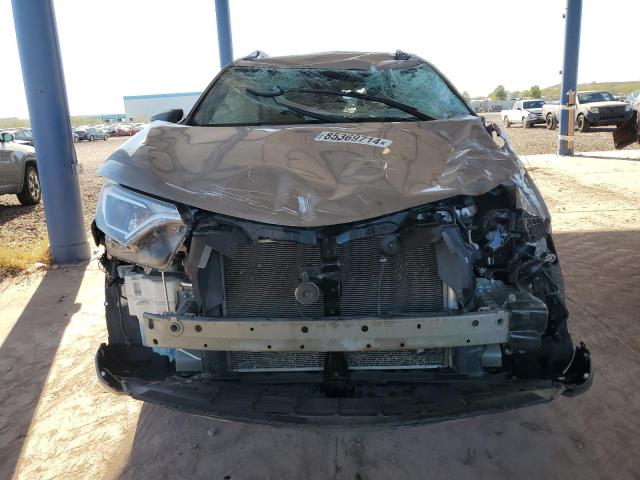 Photo 5 from auction – 2017 TOYOTA RAV4 LE with VIN 2T3BFREV0HW672924