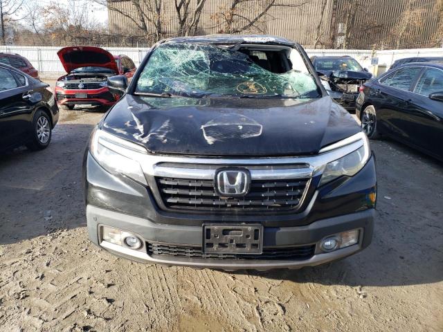 Photo 5 from auction – 2020 HONDA RIDGELINE with VIN 5FPYK3F74LB015326