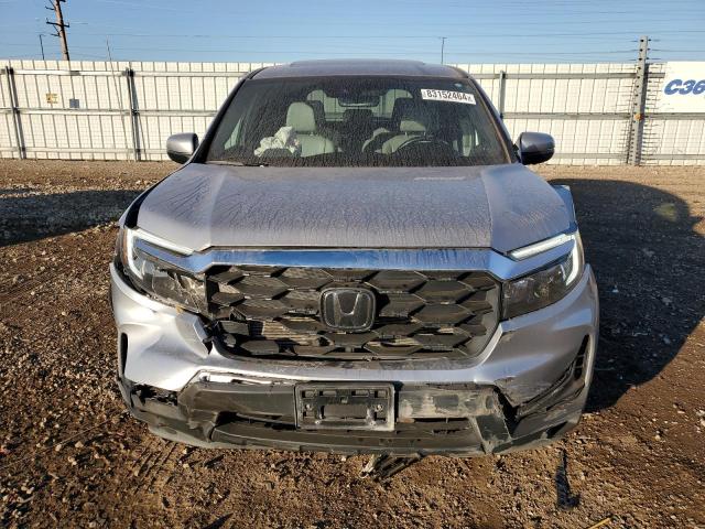 Photo 5 from auction – 2022 HONDA PASSPORT E with VIN 5FNYF8H5XNB008633