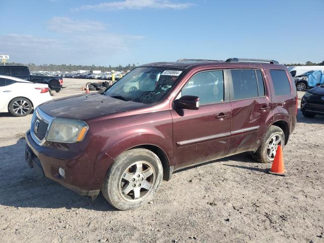HONDA PILOT TOUR 2011 with VIN 5FNYF3H9XBB023182 - Photo from auction