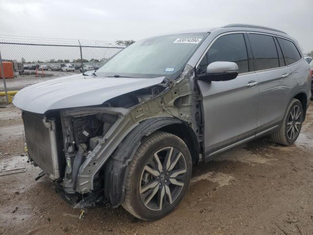 HONDA PILOT TOUR 2020 with VIN 5FNYF6H94LB004680 - Photo from auction