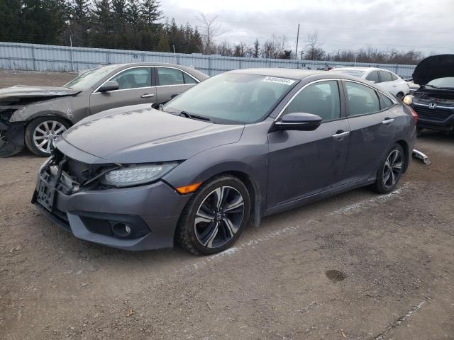 HONDA CIVIC TOUR 2017 with VIN 2HGFC1F98HH102734 - Photo from auction