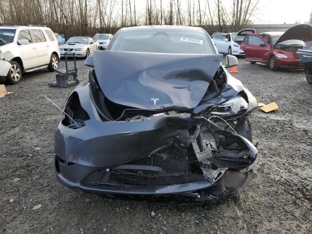 Photo 5 from auction – 2023 TESLA MODEL Y with VIN 7SAYGDED8PF934679