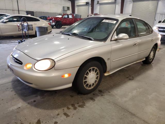 FORD TAURUS SE 1999 with VIN 1FAFP53S1XA141136 - Photo from auction