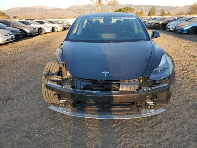 Photo 5 from auction – 2022 TESLA MODEL 3 with VIN 5YJ3E1EB0NF130660