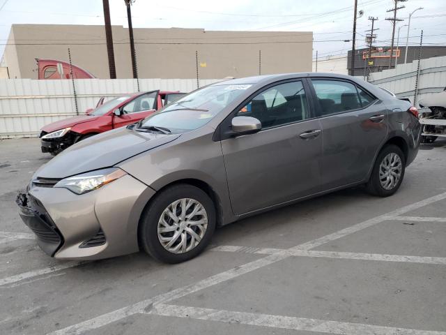 TOYOTA COROLLA L 2017 with VIN 5YFBURHE8HP593965 - Photo from auction
