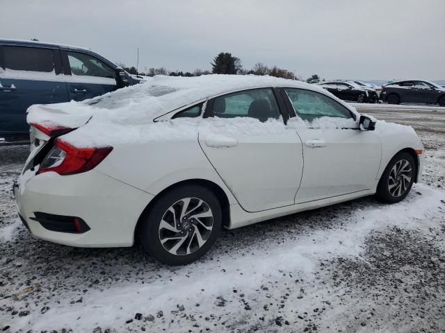 Photo 3 from auction – 2017 HONDA CIVIC EX with VIN 2HGFC2F7XHH567049