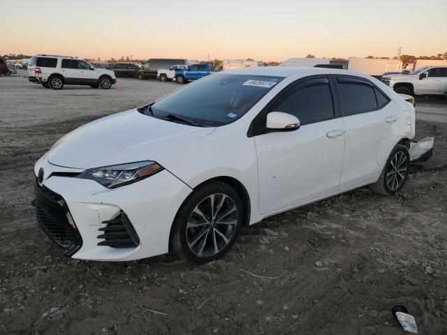 TOYOTA COROLLA L 2017 with VIN 5YFBURHE8HP709665 - Photo from auction