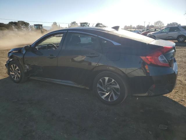 Photo 2 from auction – 2018 HONDA CIVIC EX with VIN 2HGFC2F70JH606303