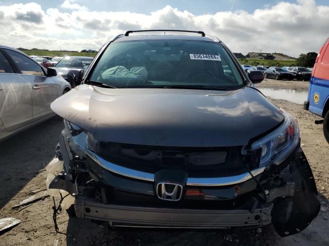 Photo 5 from auction – 2015 HONDA CR-V EXL with VIN 2HKRM3H71FH516457