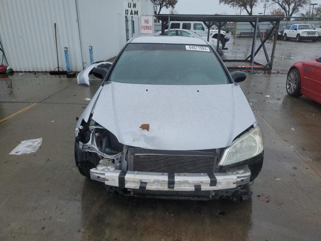 Photo 5 from auction – 2004 HONDA CIVIC LX with VIN 1HGEM22574L052231