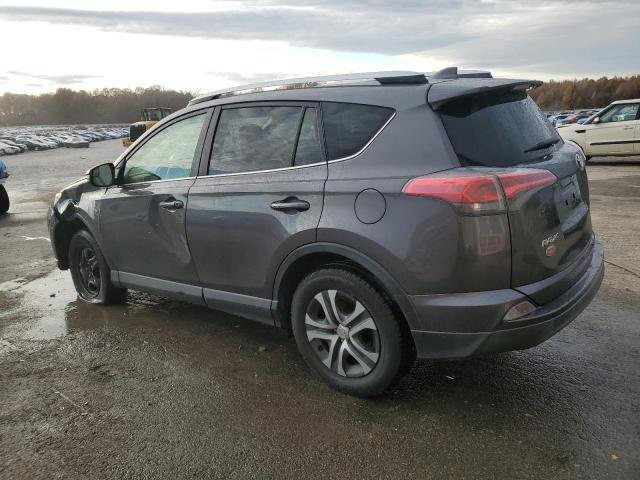 Photo 2 from auction – 2016 TOYOTA RAV4 LE with VIN JTMZFREVXGJ063240