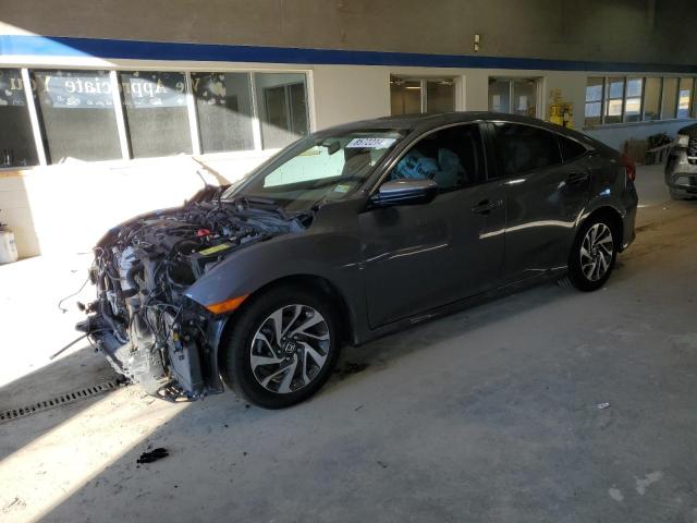 HONDA CIVIC EX 2018 with VIN 2HGFC2F77JH580864 - Photo from auction