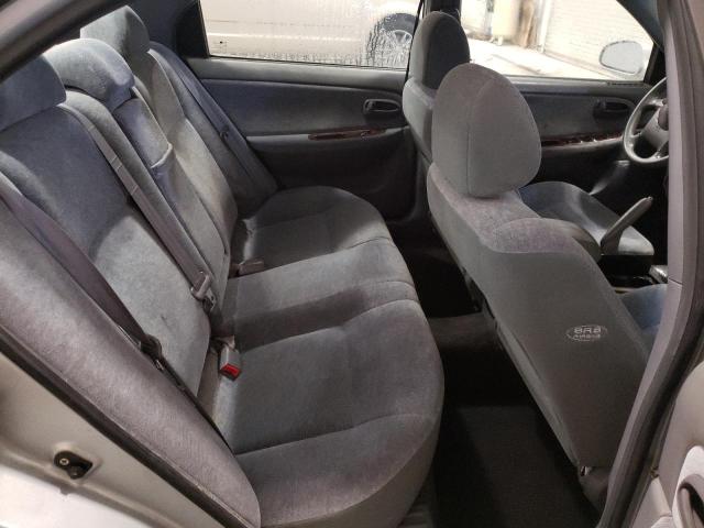Photo 10 from auction – 2004 KIA OPTIMA LX with VIN KNAGD128745334656